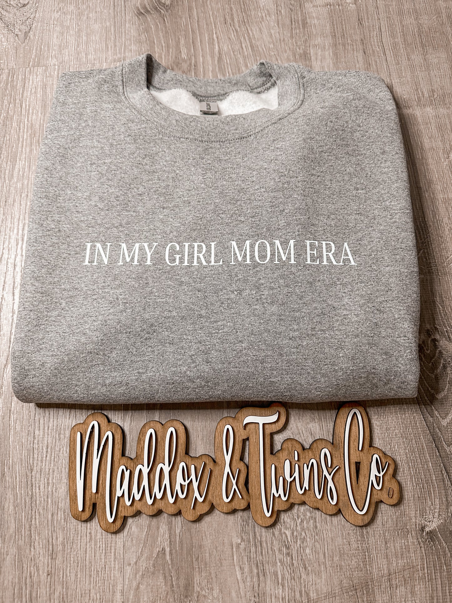 In my BOY/GIRL MOM ERA Tee