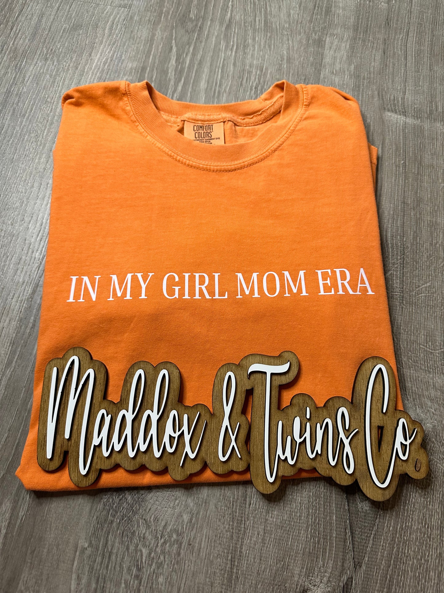 In my BOY/GIRL MOM ERA Tee