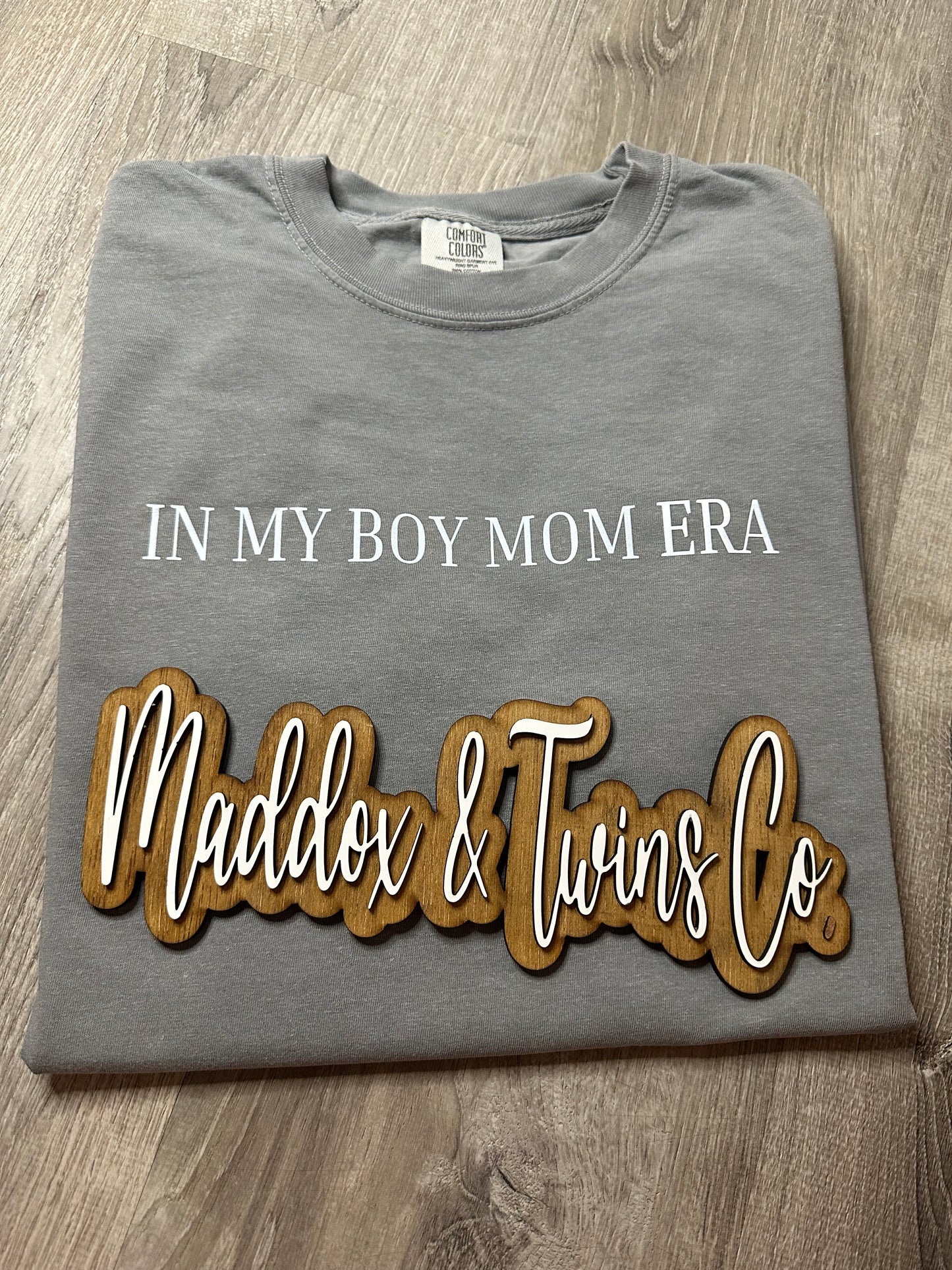 In my BOY/GIRL MOM ERA Tee
